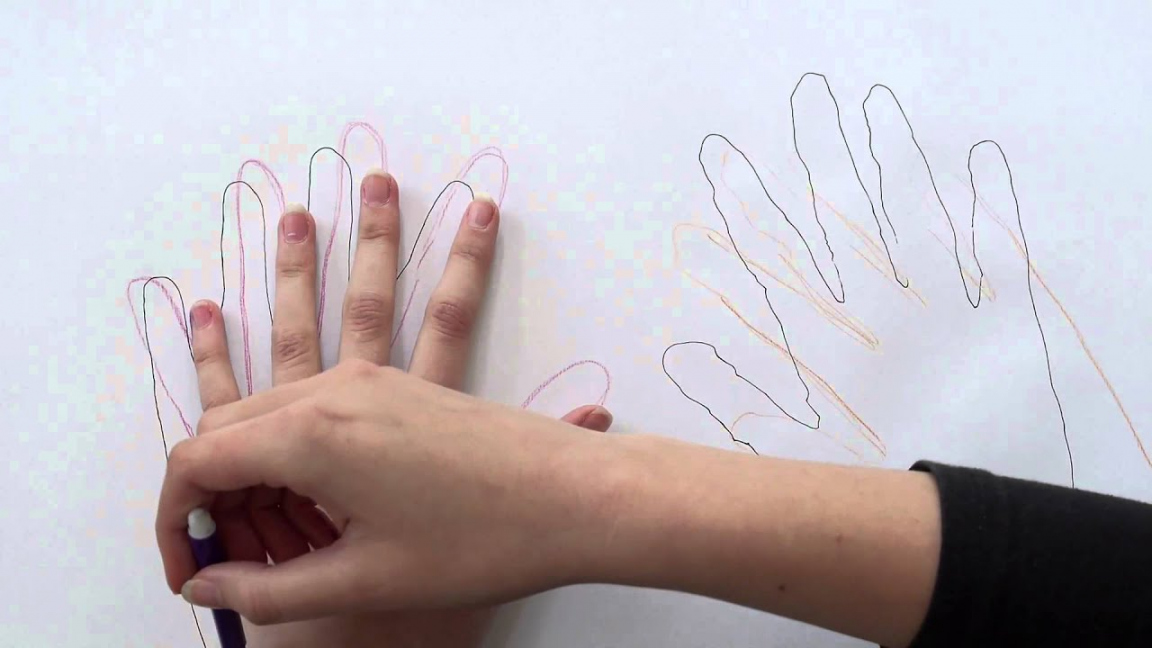 Tracing and labelling hands - Northwest Montessori Preschool - FREE Printables - Traced Hand