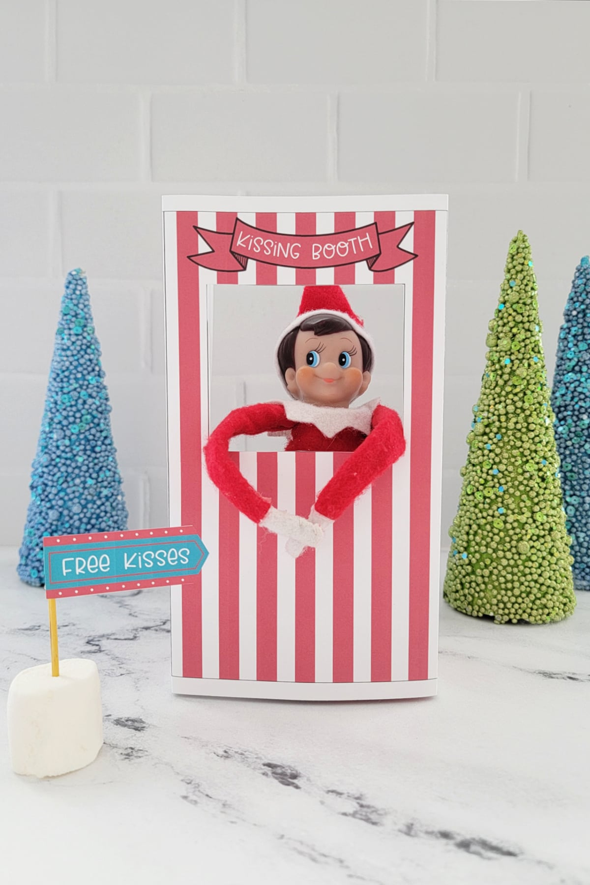 Elf On The Shelf Kissing Booth (Free Printable) - Fun Money Mom within Elf Kissing Booth Free Printable